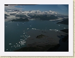 Alaska 403 * This view of Alsek Lake from above shows a clear line of mixing water from the silt-laden, brown water of the Alsek River with suspended glacial silt of Alsek Lake. * This view of Alsek Lake from above shows a clear line of mixing water from the silt-laden, brown water of the Alsek River with suspended glacial silt of Alsek Lake. * 2816 x 2112 * (1.25MB)